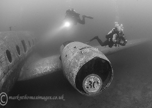 Divers on plane.
Capernwray. by Mark Thomas 